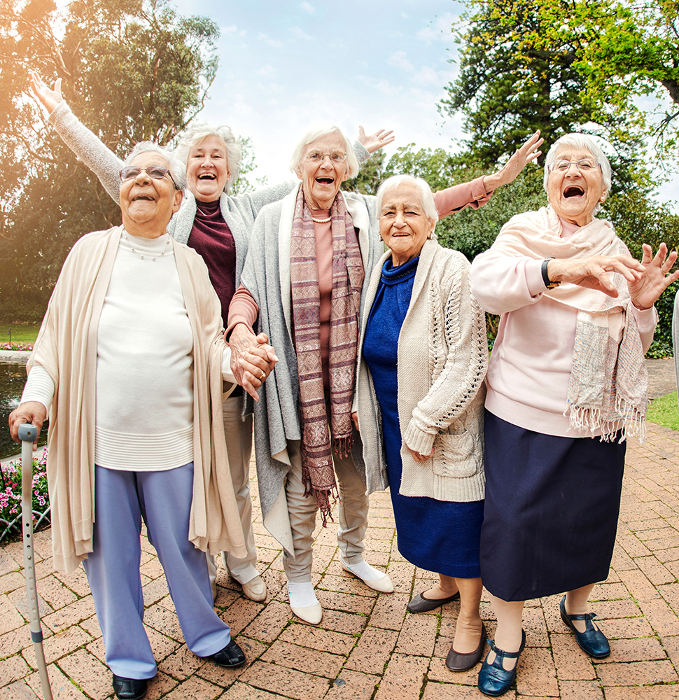 Group of very happy senior women outside