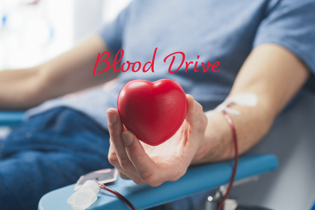 Man giving blood at a blood drive